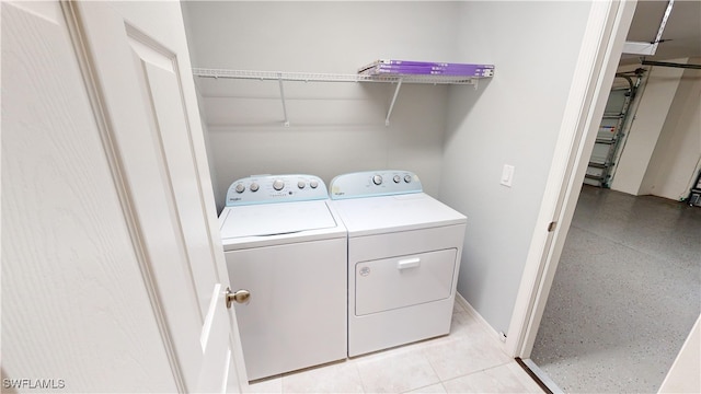 laundry room featuring washing machine and dryer