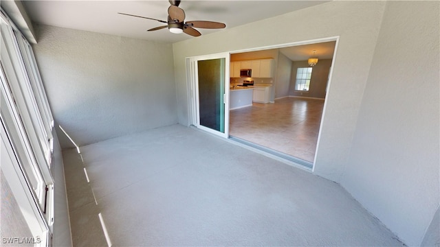 empty room featuring ceiling fan