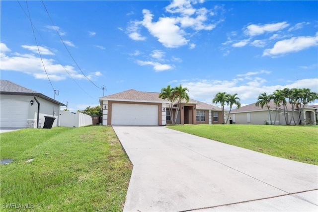 ranch-style house with a garage and a front lawn