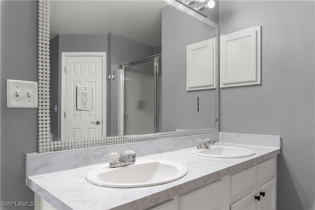 bathroom featuring vanity and walk in shower