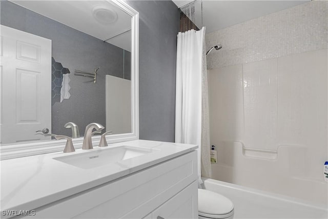 full bathroom featuring shower / bath combination with curtain, vanity, and toilet