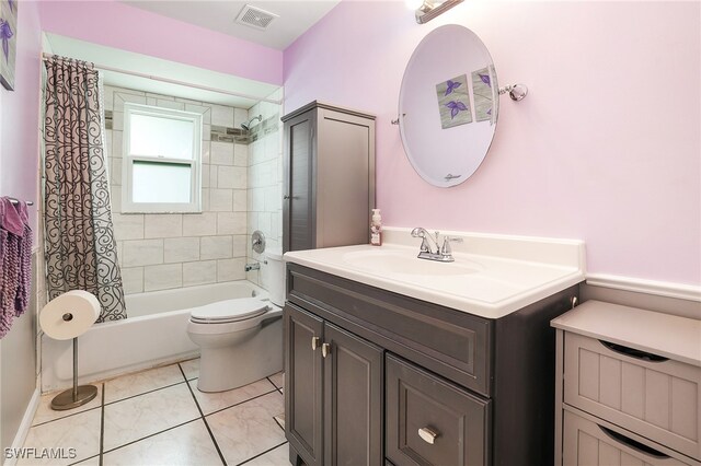 full bathroom featuring vanity, toilet, and shower / bath combination with curtain