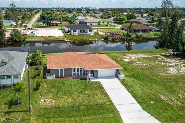 drone / aerial view featuring a water view