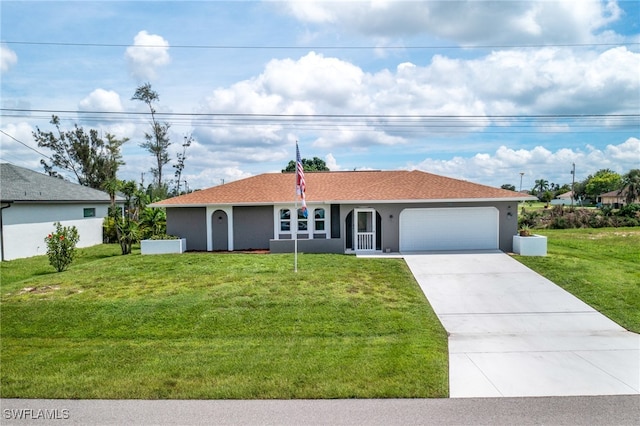 single story home with a garage and a front lawn