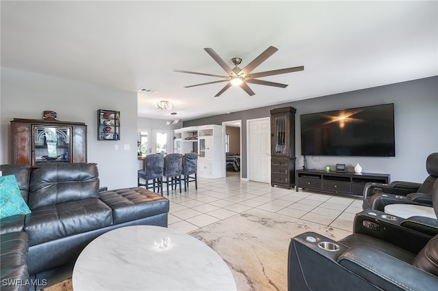 tiled living room featuring ceiling fan