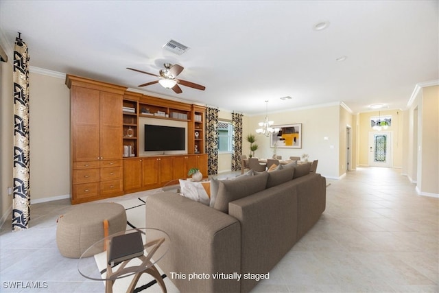 tiled living room featuring ceiling fan with notable chandelier and ornamental molding