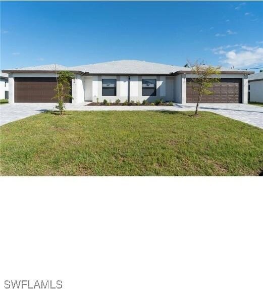317-319 SW 47th Ter, Cape Coral, FL 33914 - photo 2
