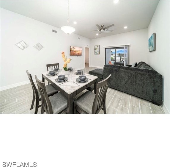 dining space featuring light hardwood / wood-style flooring and ceiling fan