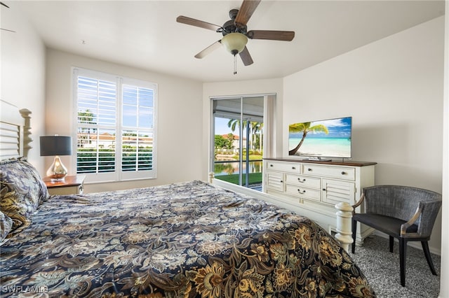 bedroom with ceiling fan and access to exterior