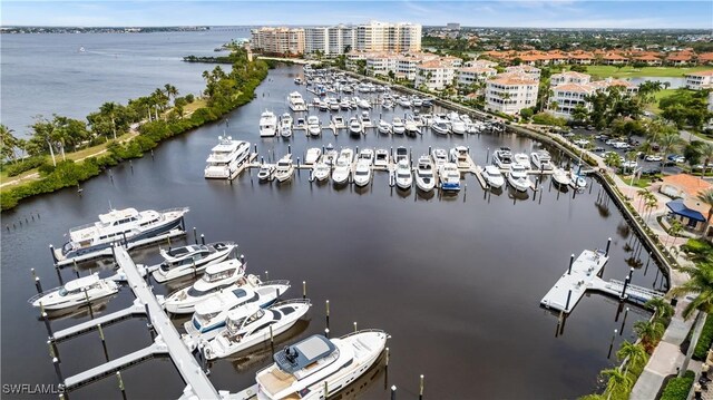 birds eye view of property featuring a water view