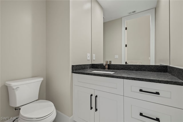 164 Colonade Cir Unit 1307, Naples, FL 34103 - bathroom featuring visible vents, toilet, and vanity