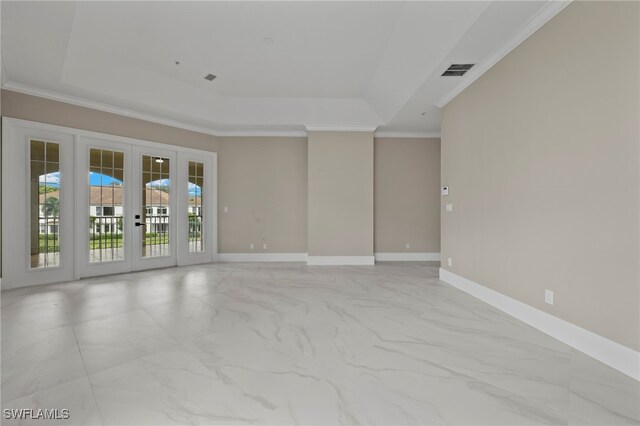 164 Colonade Cir Unit 1307, Naples, FL 34103 - spare room featuring a tray ceiling, french doors, marble finish floor, and visible vents
