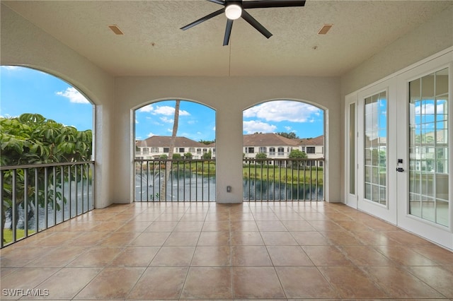 164 Colonade Cir Unit 1307, Naples, FL 34103 - view of patio featuring a residential view, a balcony, french doors, ceiling fan, and a water view
