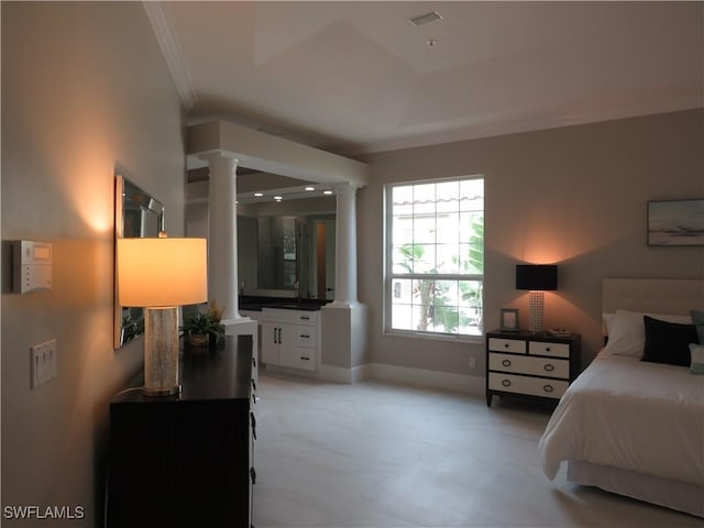 164 Colonade Cir Unit 1307, Naples, FL 34103 - bedroom with a raised ceiling, ornate columns, baseboards, and ornamental molding