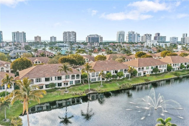 164 Colonade Cir Unit 1307, Naples, FL 34103 - drone / aerial view featuring a water view and a view of city