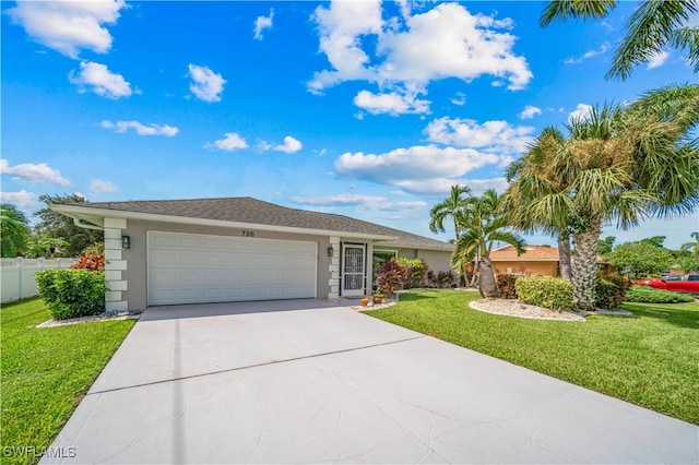 ranch-style home with a garage and a front lawn