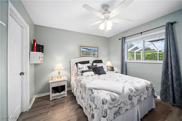 bedroom featuring dark wood-type flooring and ceiling fan