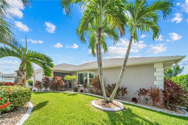 view of front of home with a front yard