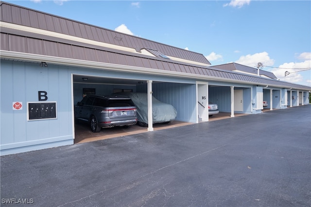 garage featuring covered parking