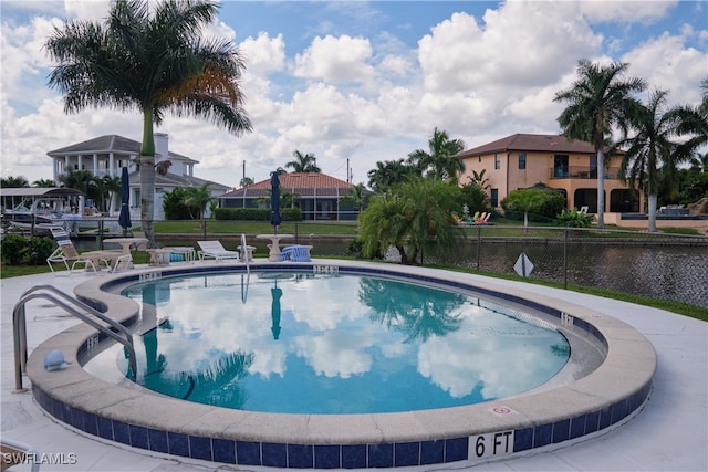 community pool with a water view