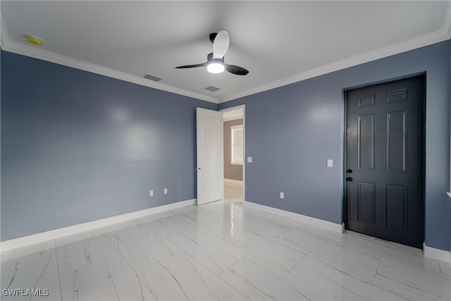 empty room with ornamental molding and ceiling fan