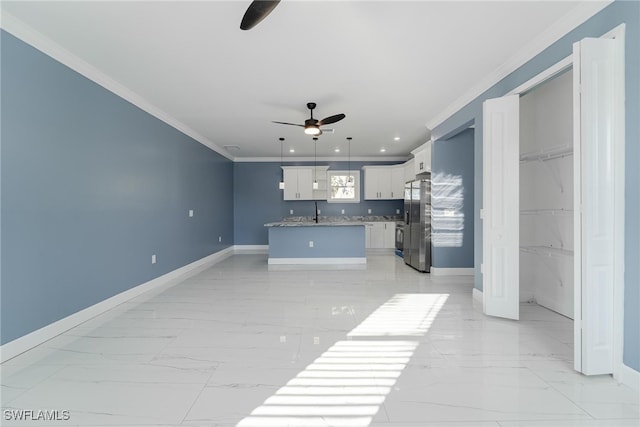 unfurnished living room with crown molding and ceiling fan