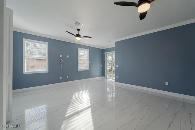 empty room with ceiling fan and ornamental molding