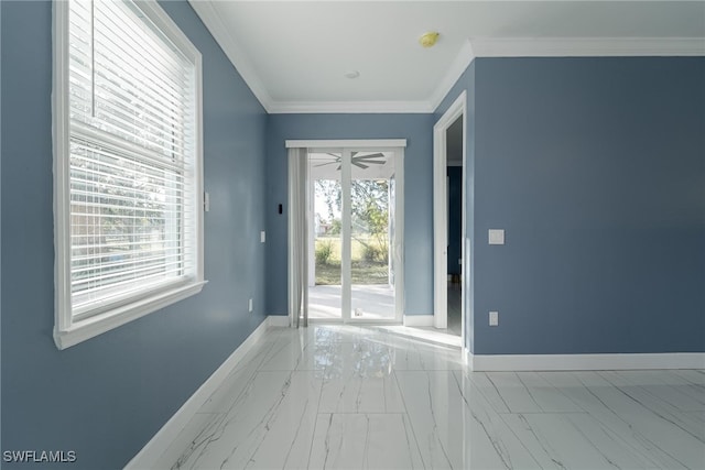 entryway featuring ornamental molding and plenty of natural light