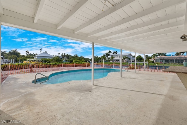 view of pool featuring a patio area