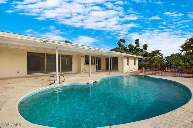 view of pool with a patio