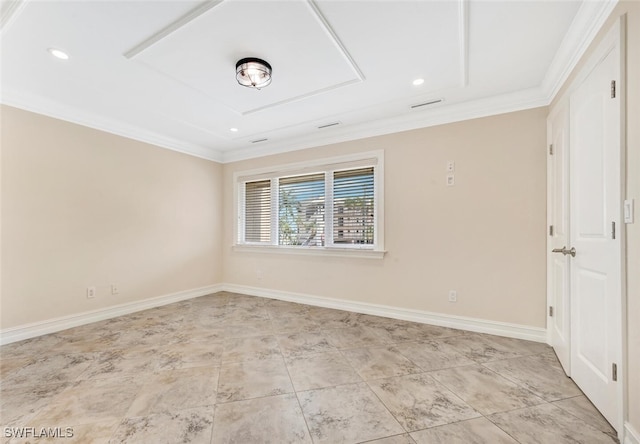 spare room featuring crown molding