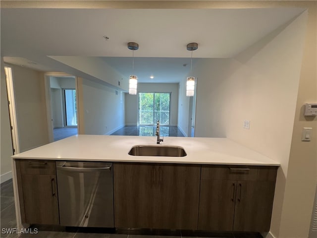 kitchen with dark brown cabinets, dishwasher, hanging light fixtures, kitchen peninsula, and sink