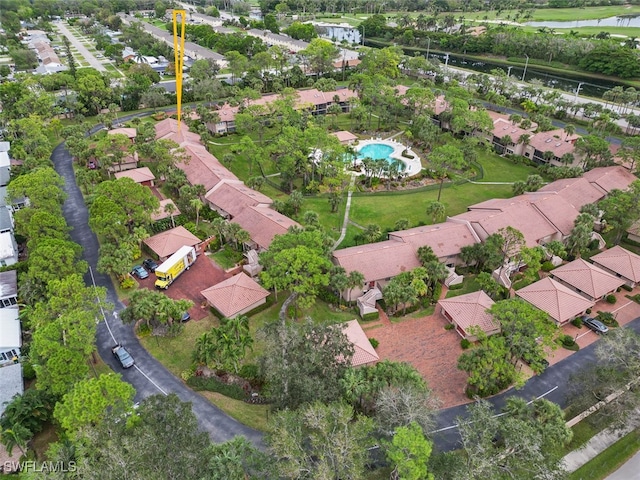 aerial view with a water view and a residential view