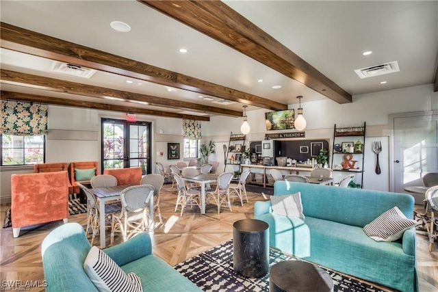 living room featuring beam ceiling, french doors, and light parquet flooring