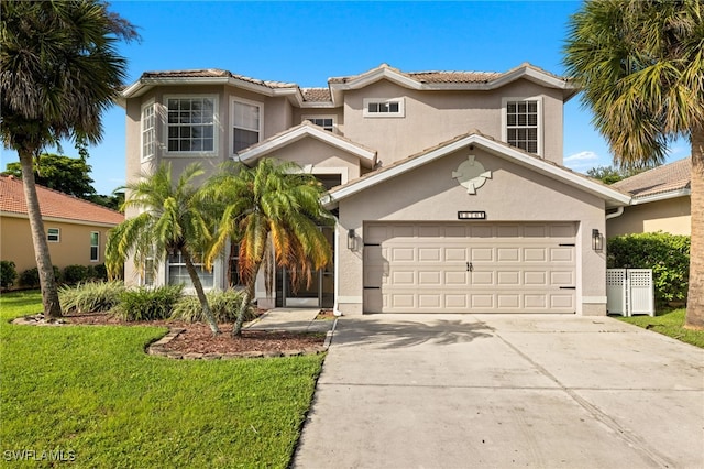 mediterranean / spanish-style home featuring a front lawn