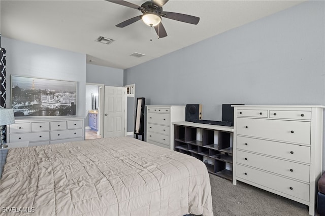 bedroom with connected bathroom, ceiling fan, and light colored carpet