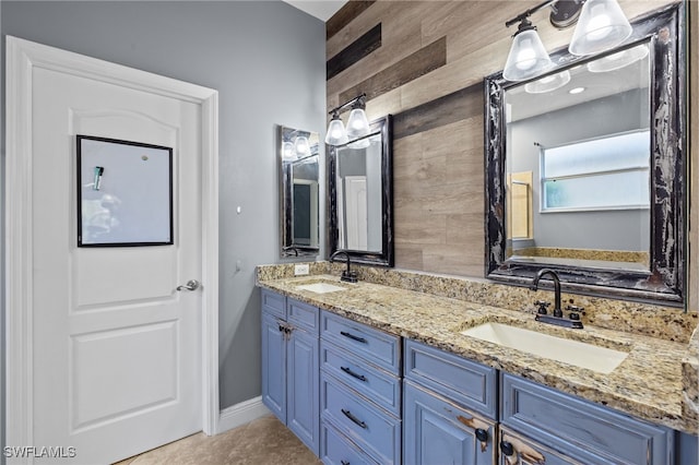 bathroom featuring vanity and tile patterned flooring