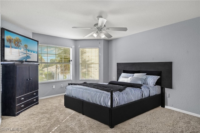 bedroom with carpet floors and ceiling fan