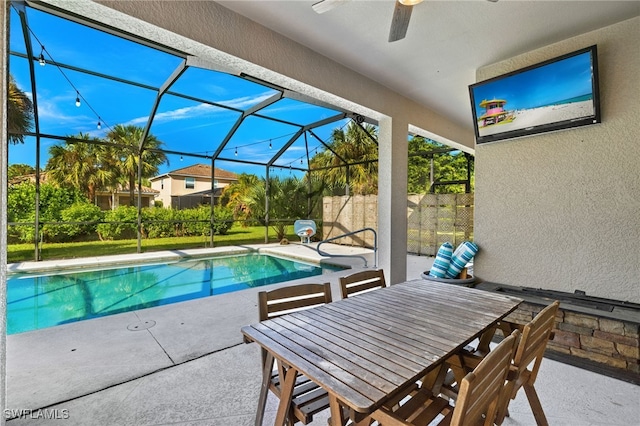 view of pool featuring a patio area and a lanai