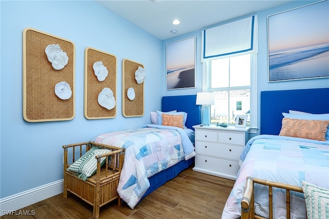 bedroom featuring dark hardwood / wood-style floors