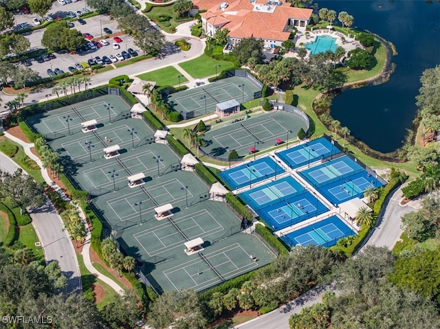 birds eye view of property with a water view