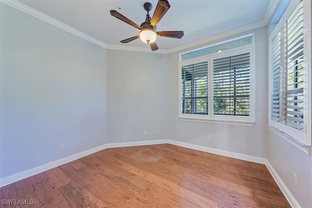 unfurnished room featuring crown molding, hardwood / wood-style flooring, and ceiling fan