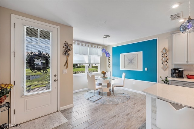 dining room featuring light hardwood / wood-style floors