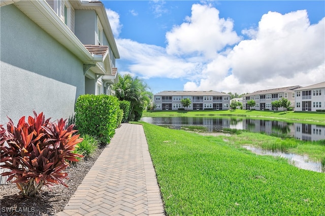 view of yard with a water view