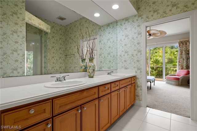 bathroom with tile patterned flooring and vanity