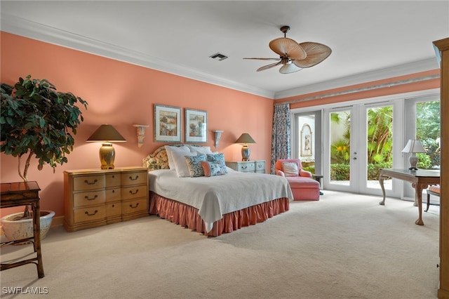 bedroom with ceiling fan, french doors, light carpet, crown molding, and access to exterior