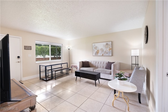 tiled living room with a textured ceiling