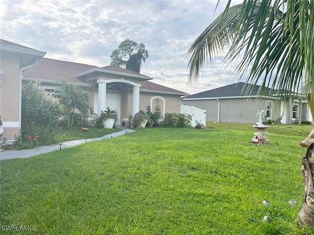 view of front of house with a front yard