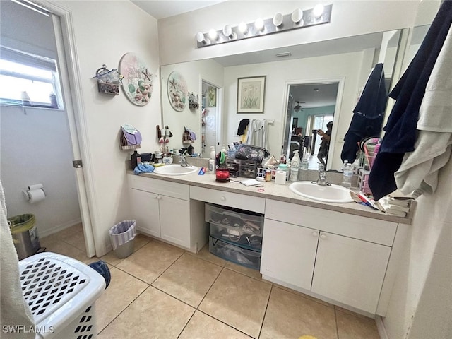 bathroom featuring tile patterned floors and vanity