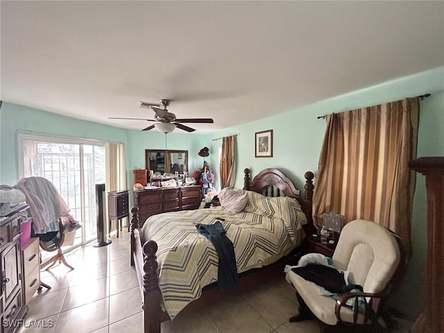 bedroom featuring ceiling fan and light tile patterned floors